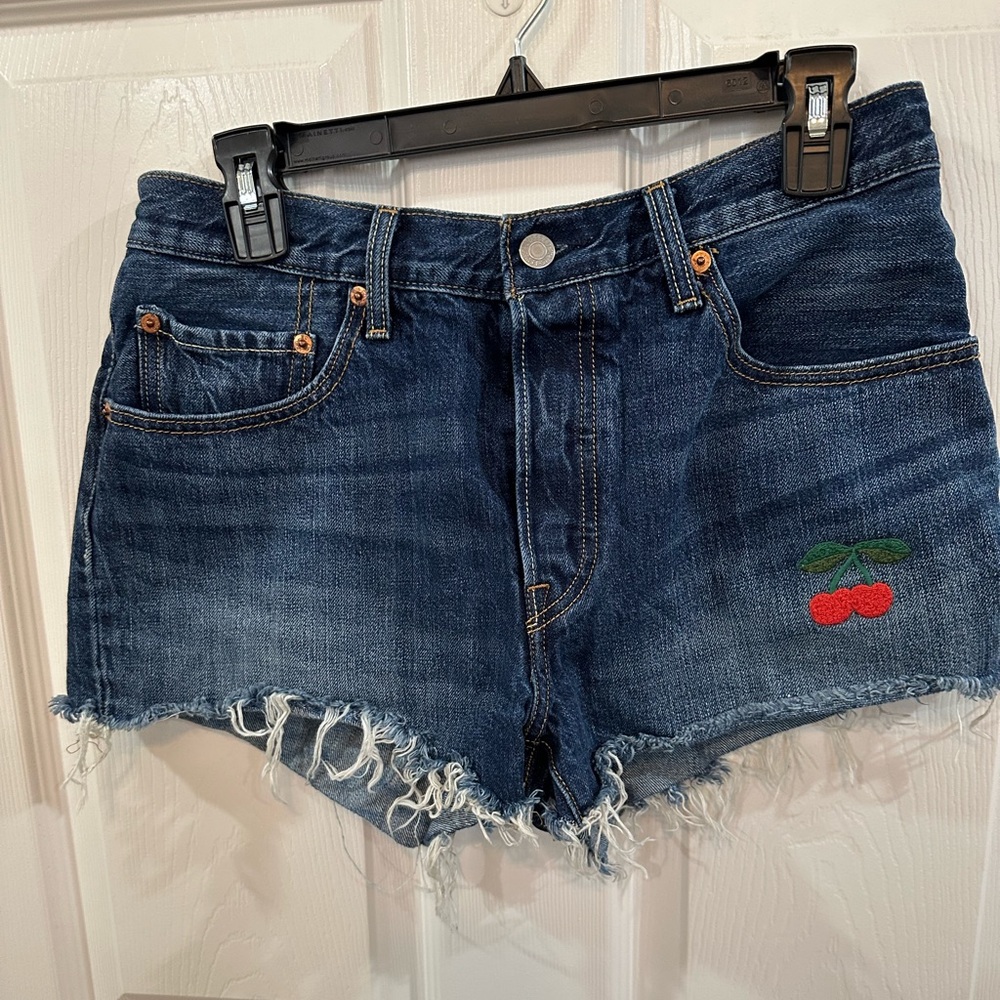 Levi’s Cherry shorts. 2-3 inch inseam.  Button fly 501!